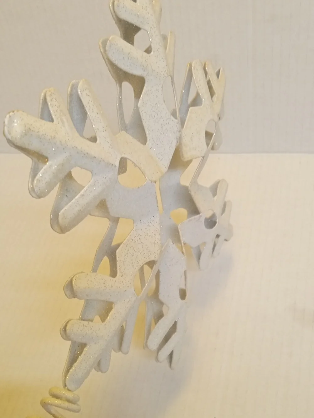 Snowflake Christmas tree topper white glitter metal with a spring base 13